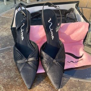 Pointed toe dressy sling back shoes by Nina. Classy and sassy!!